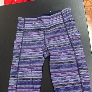 Lululemon size 2 purple stripe leggings with pockets